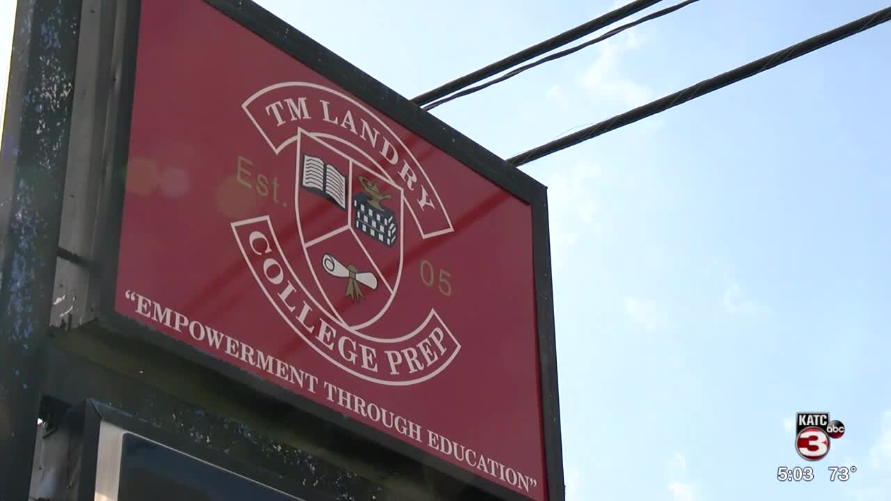 T.M. Landry College Prep sign reading "Empowerment Through Education"