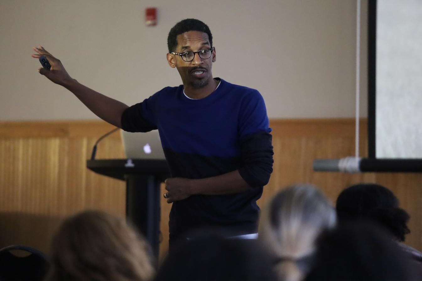Akil Bello presenting